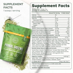 Primal Harvest Super Greens powder scoop next to jar.