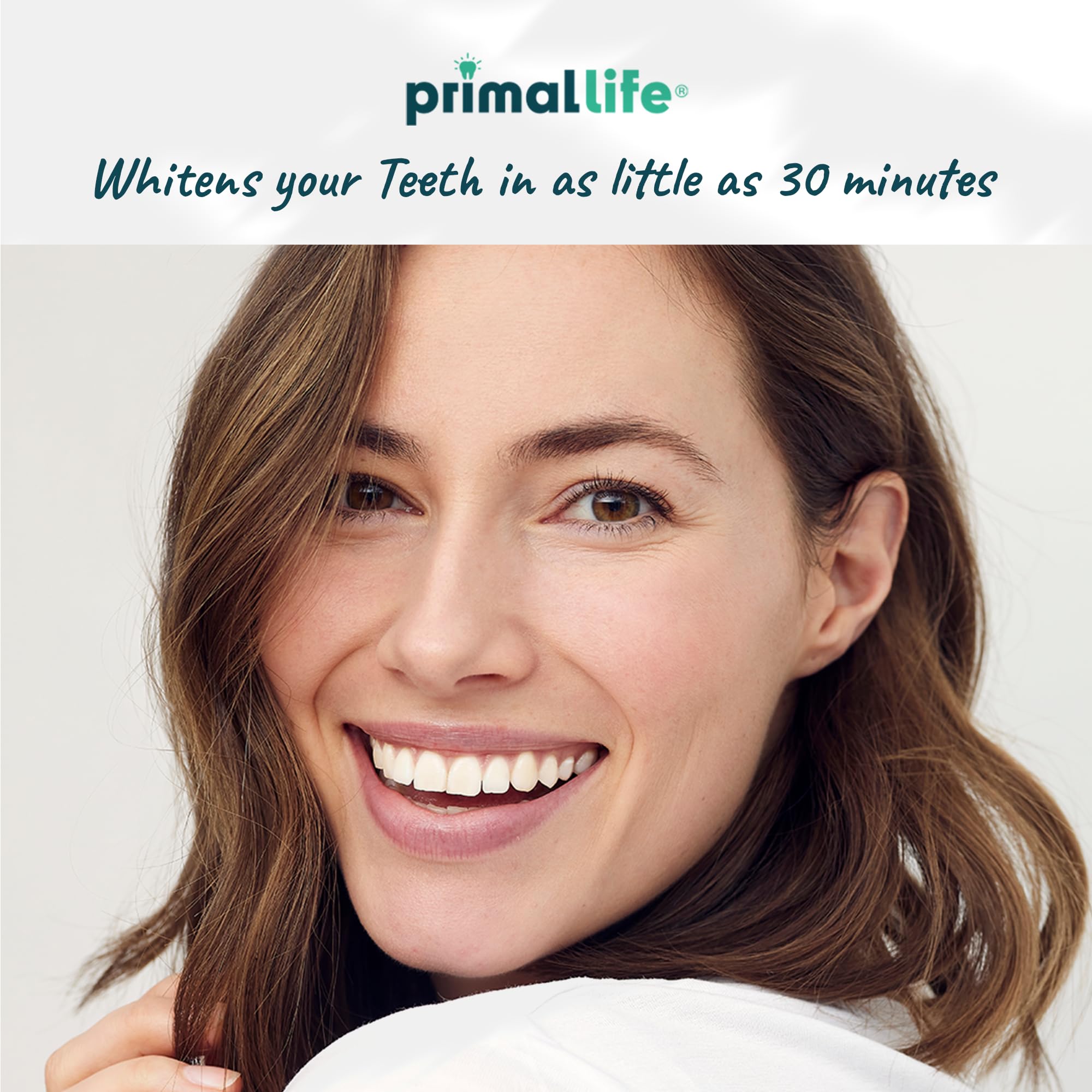 Whitening strips being applied to teeth