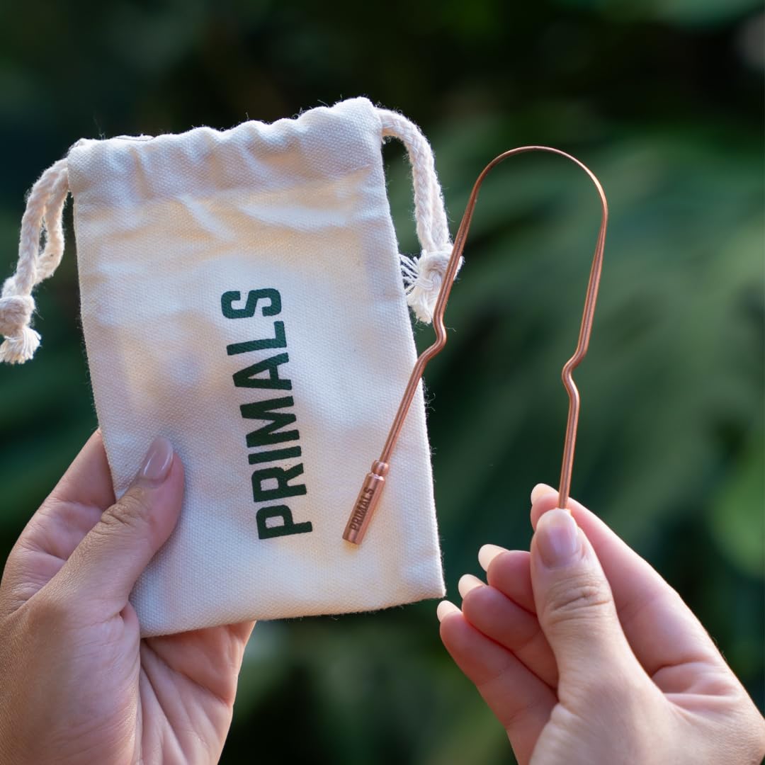 Packaging including cloth pouch for PRIMALS tongue scraper