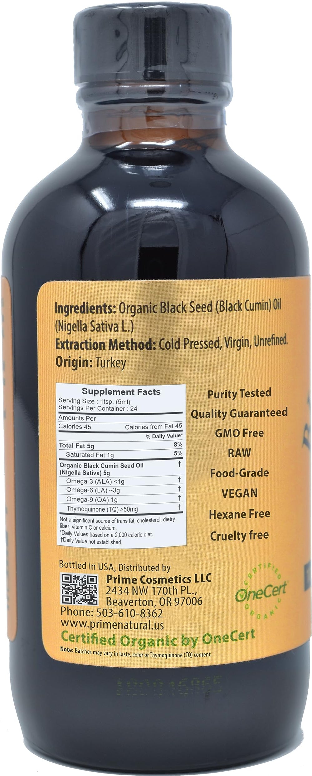 Side view of the black seed oil bottle showing the label
