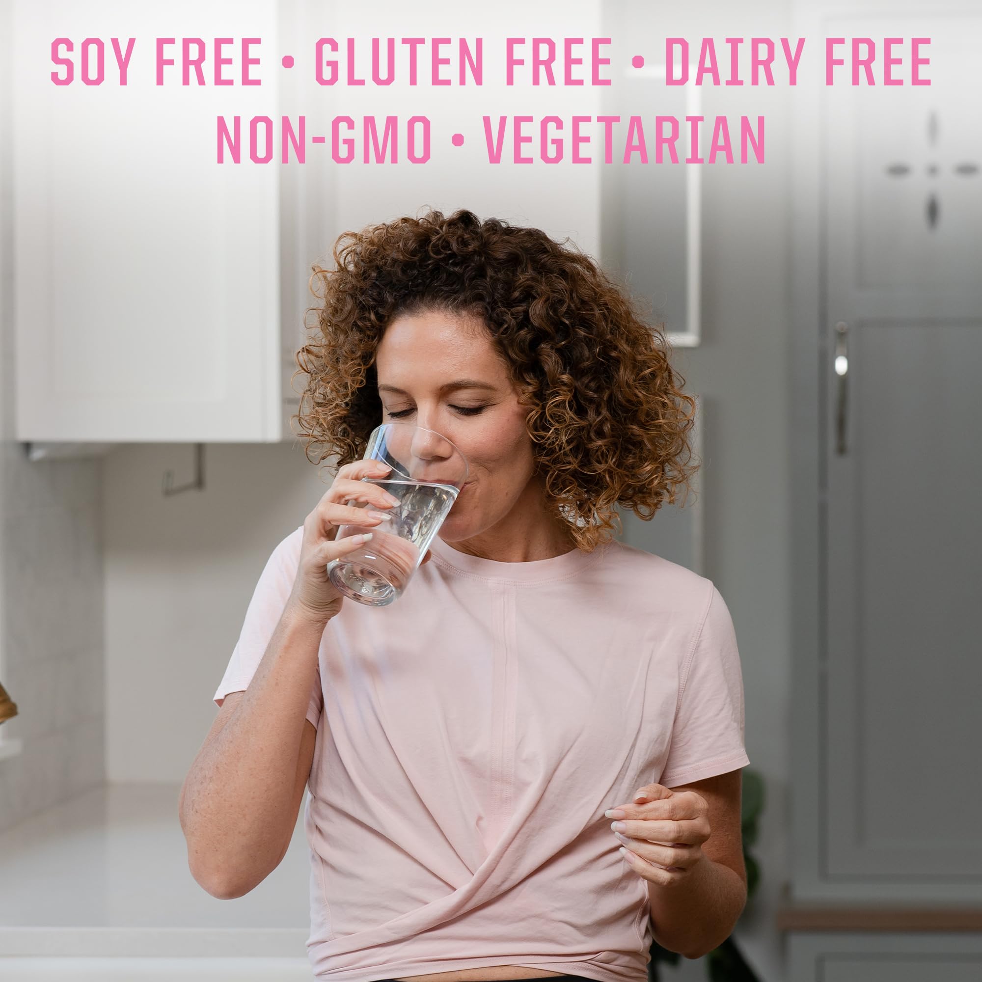 Active woman taking probiotic capsules for gut support