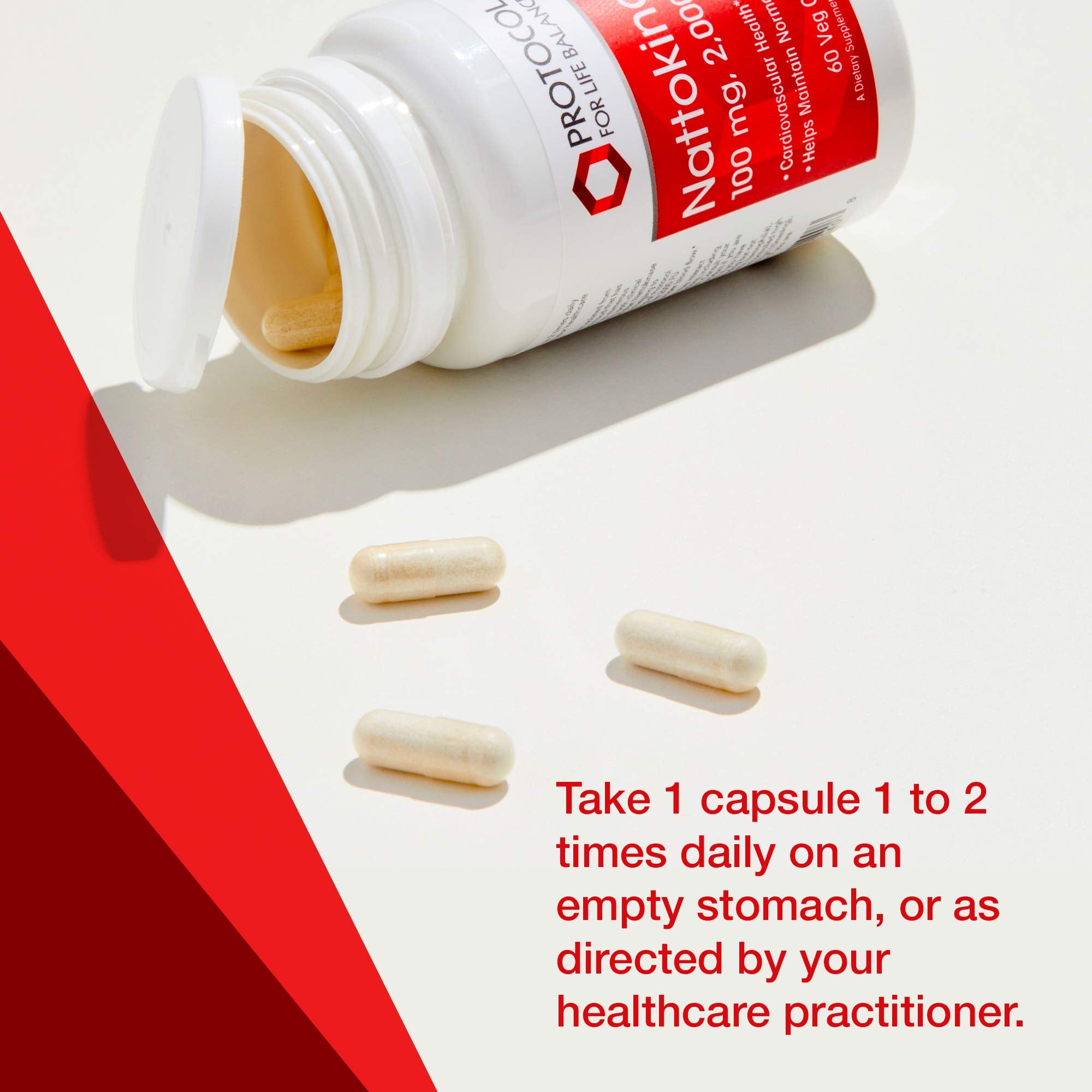 Close-up of supplement facts panel showing 100mg and 2000 FU per capsule