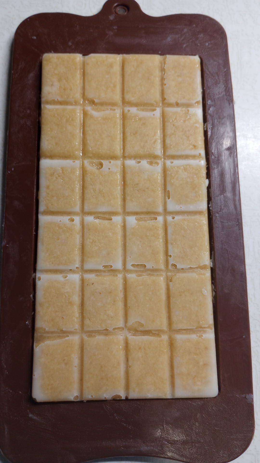 Prymal Instinct close-up of dense bar texture highlighting natural ingredients