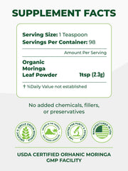 Close-up of 100% moringa leaf powder in scoop