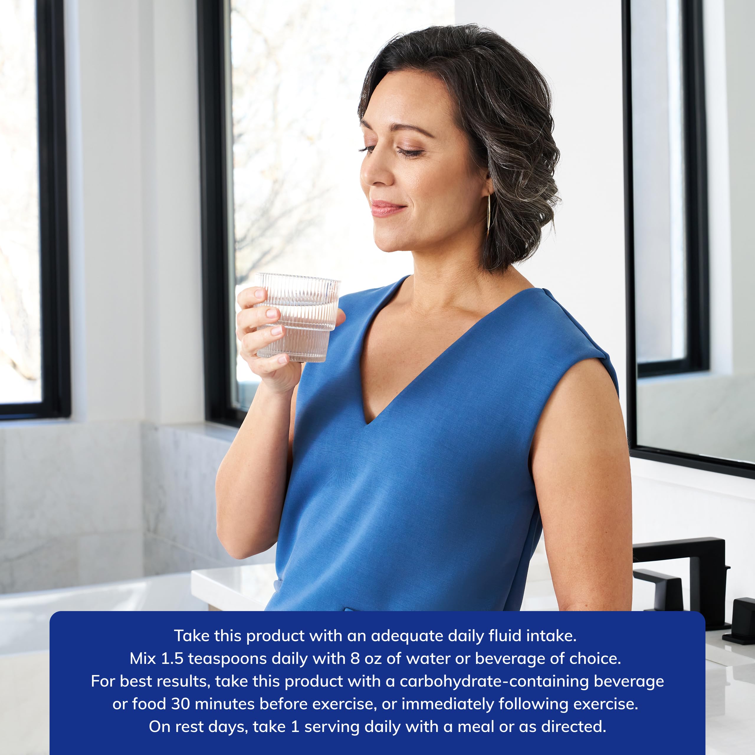 Creatine powder being poured into a measuring scoop