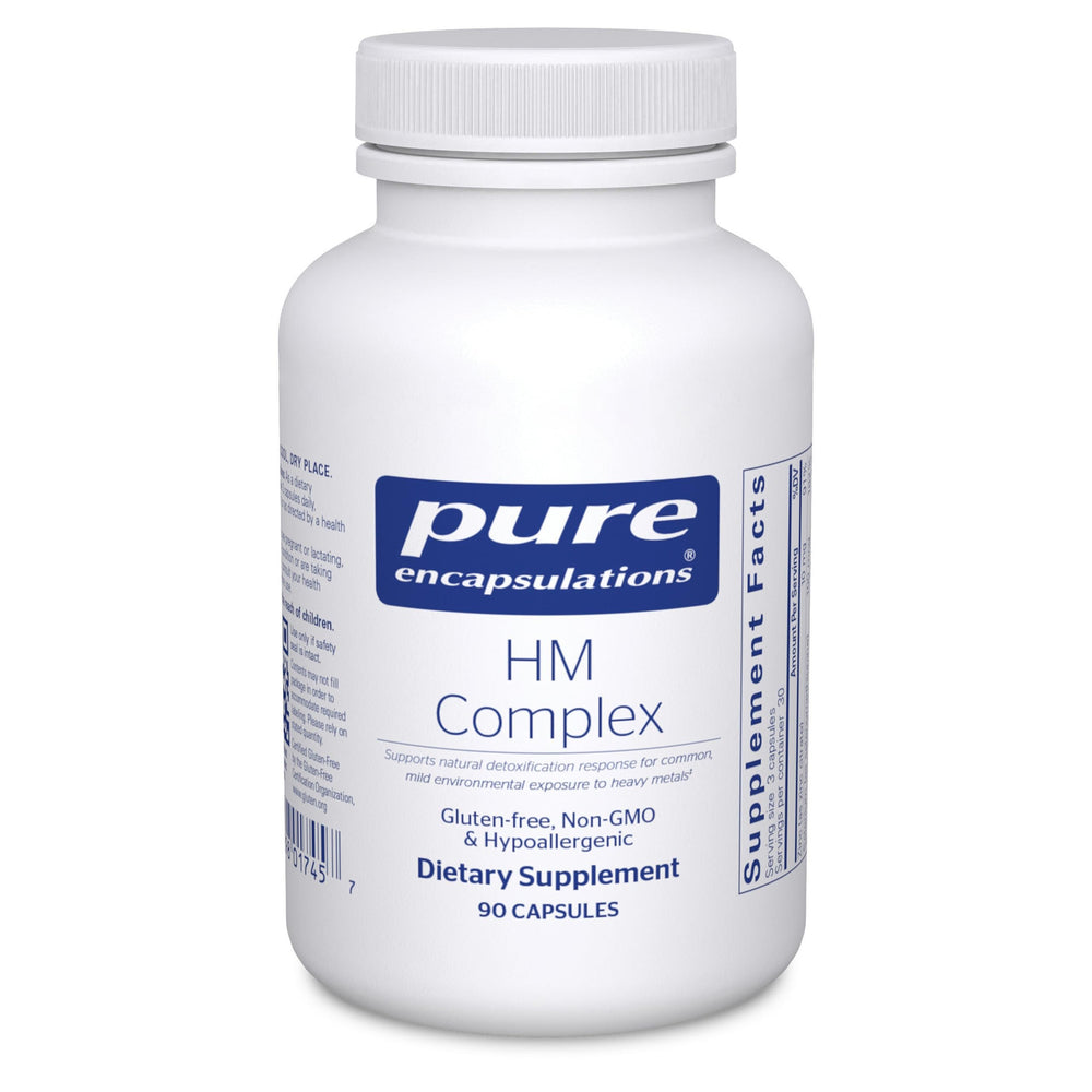 Pure Encapsulations HM Complex bottle on table for daily detox support.