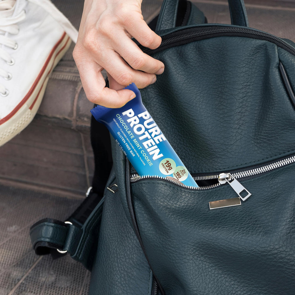 Pure Protein Chocolate Mint Cookie bar on the go, protein-packed snack