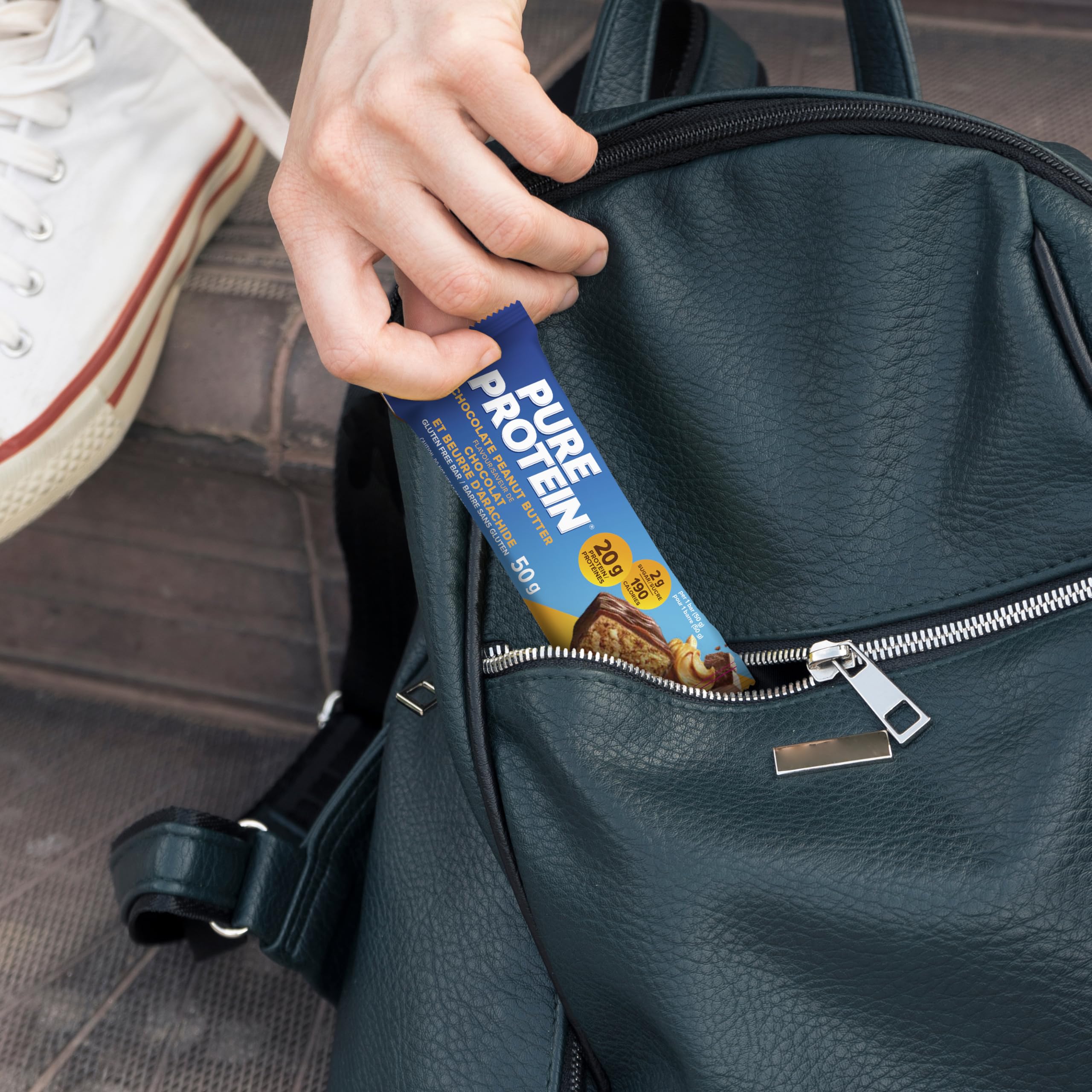 Pure Protein bars packaging shows nutrition facts for mindful snacking.