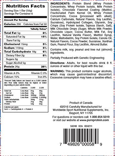 Pure Protein Chewy Chocolate Chip bar bite closeup reveals chewy texture and chips.