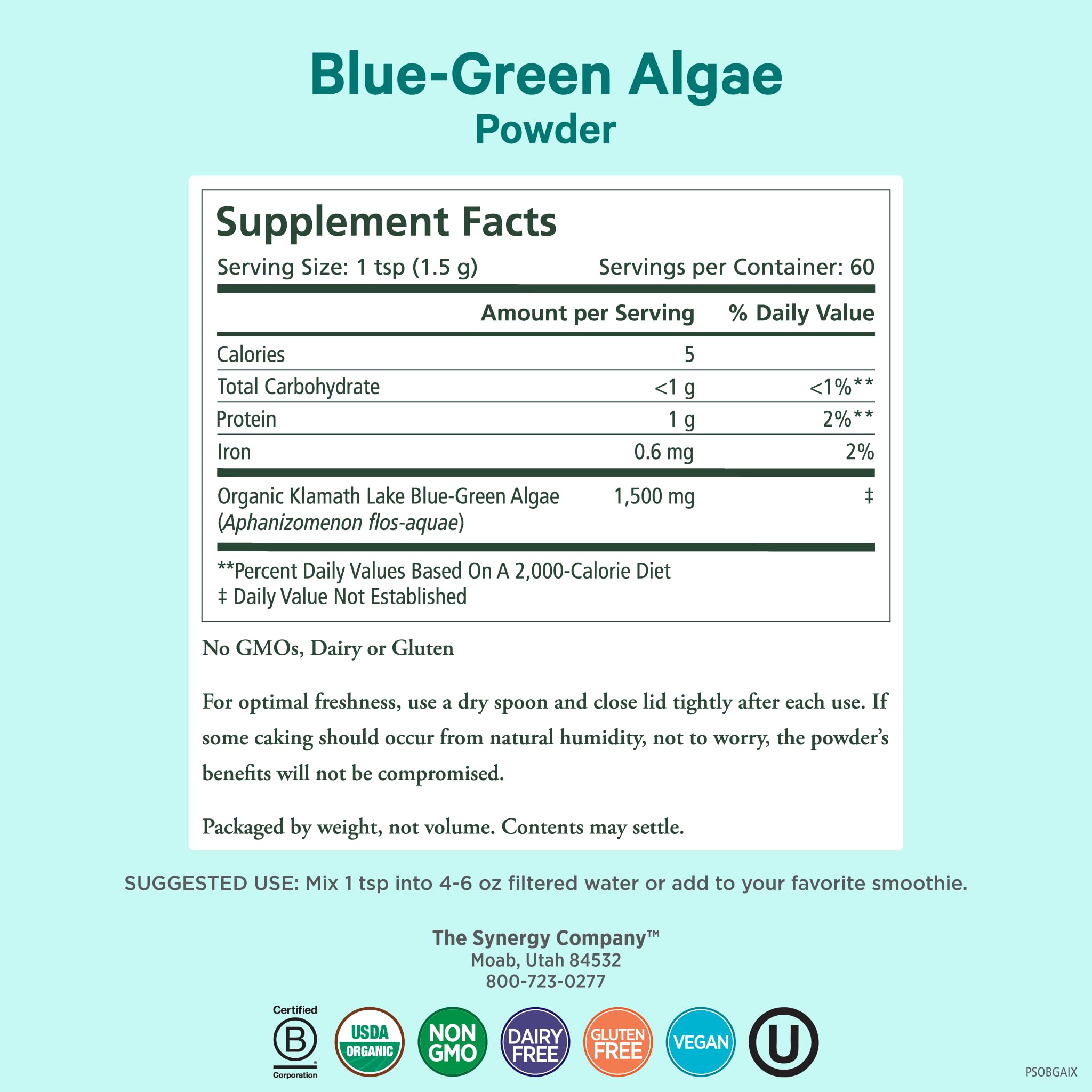 Measuring scoop of PURE SYNERGY Blue-Green Algae powder in glass