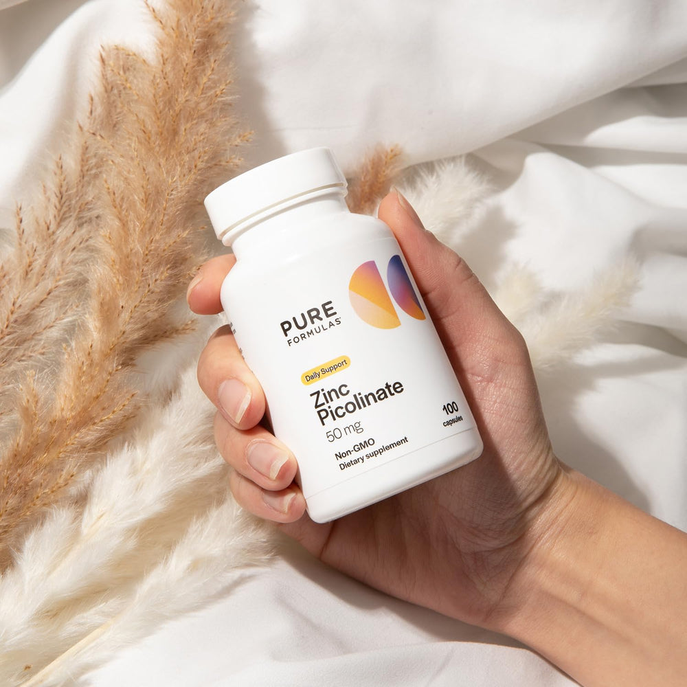 Pouring zinc picolinate capsules from bottle