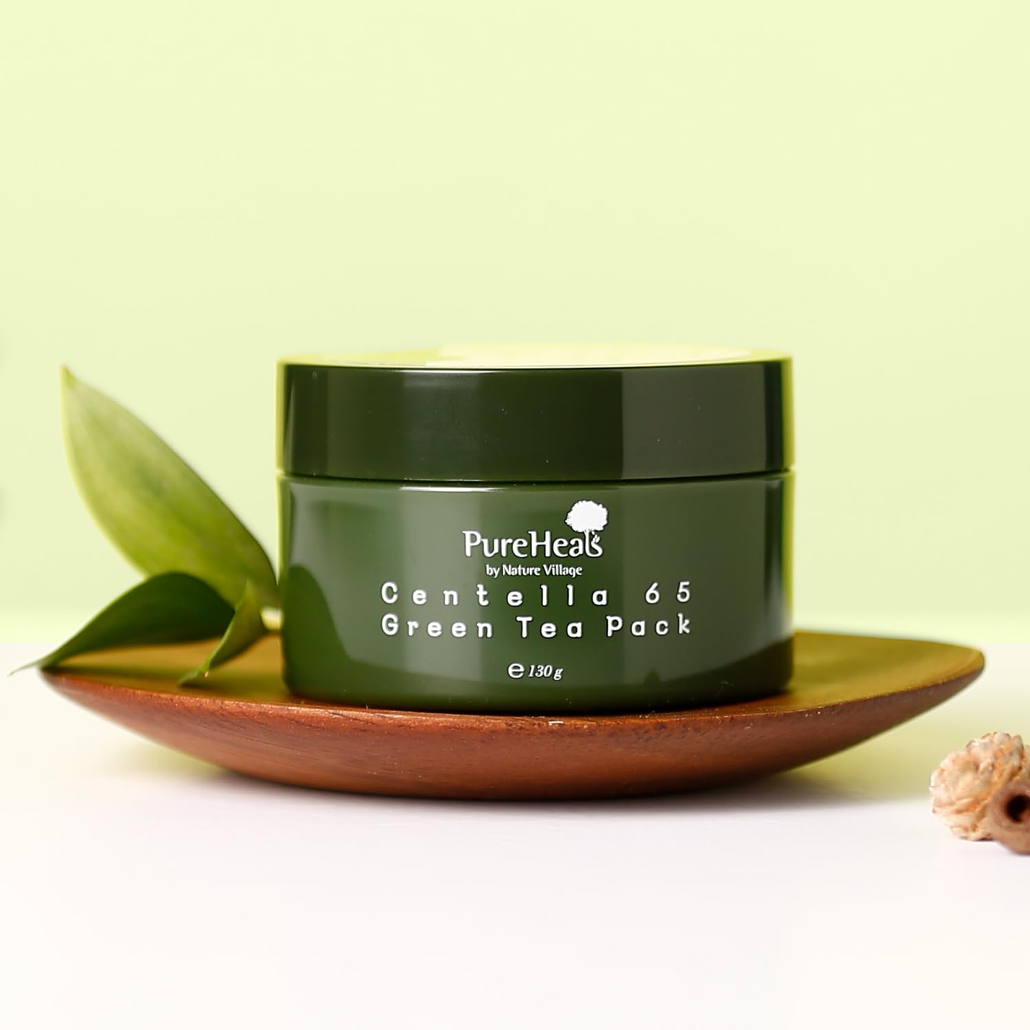 Ingredients panel highlighting Centella Asiatica 65% extract, Vitamin C, and Green Tea