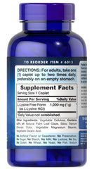 Close-up of Puritan's Pride L-Lysine 1000 mg coated caplets