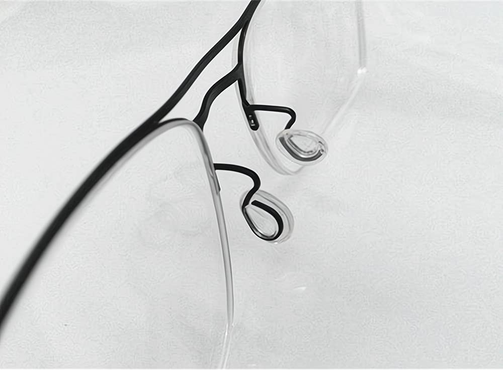 Close-up of push-in eyeglass nose pads made of soft silicone