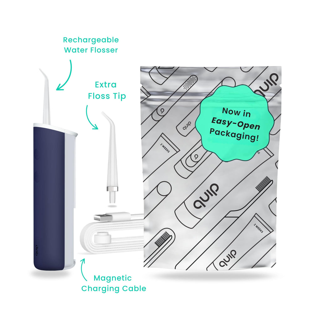 Cordless water flosser in Midnight Blue with magnetic replaceable tip