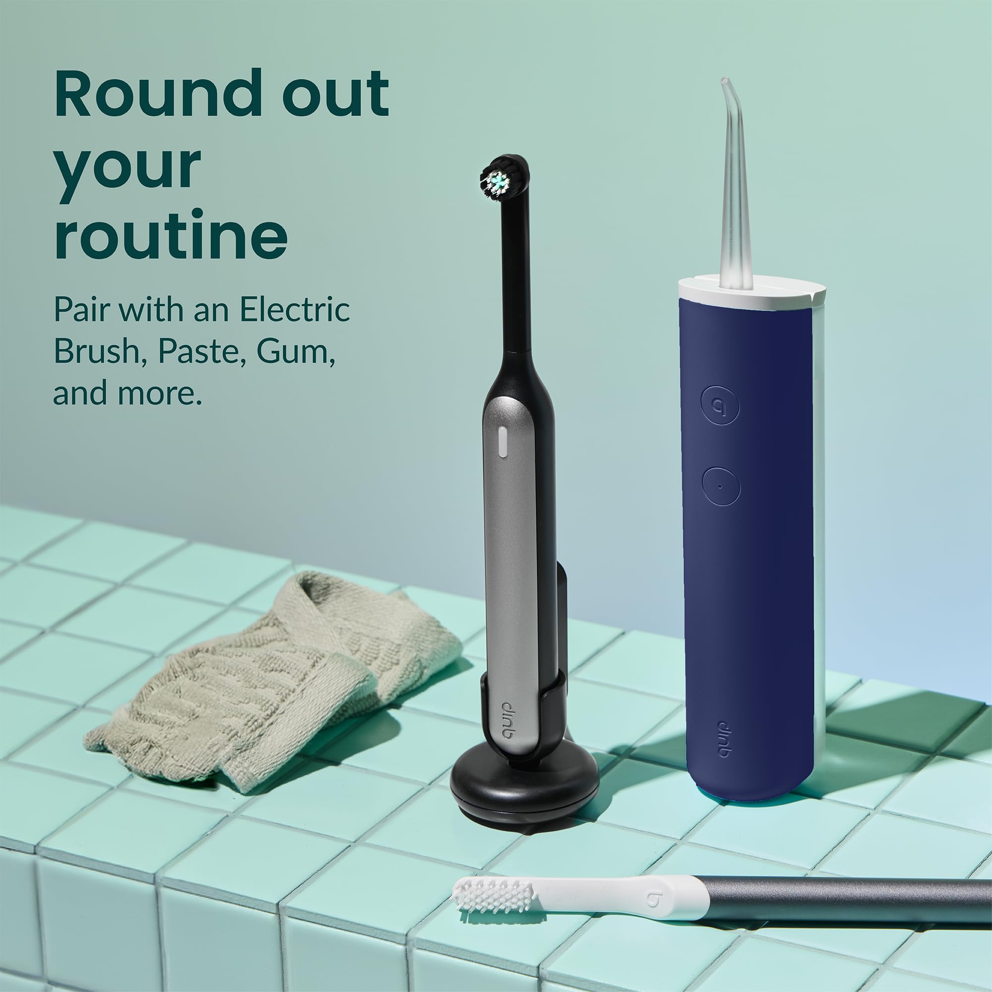 Compact Midnight Blue water flosser on countertop
