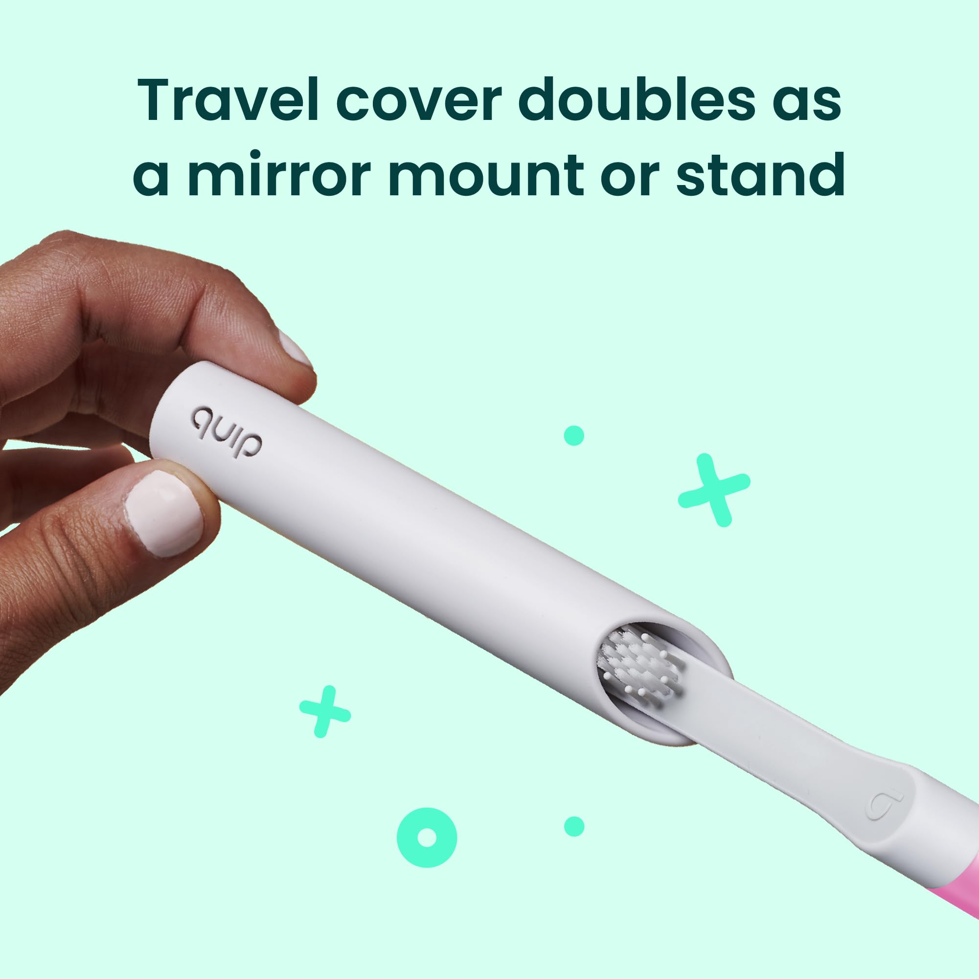Box and extra brush head included with magenta quip toothbrush