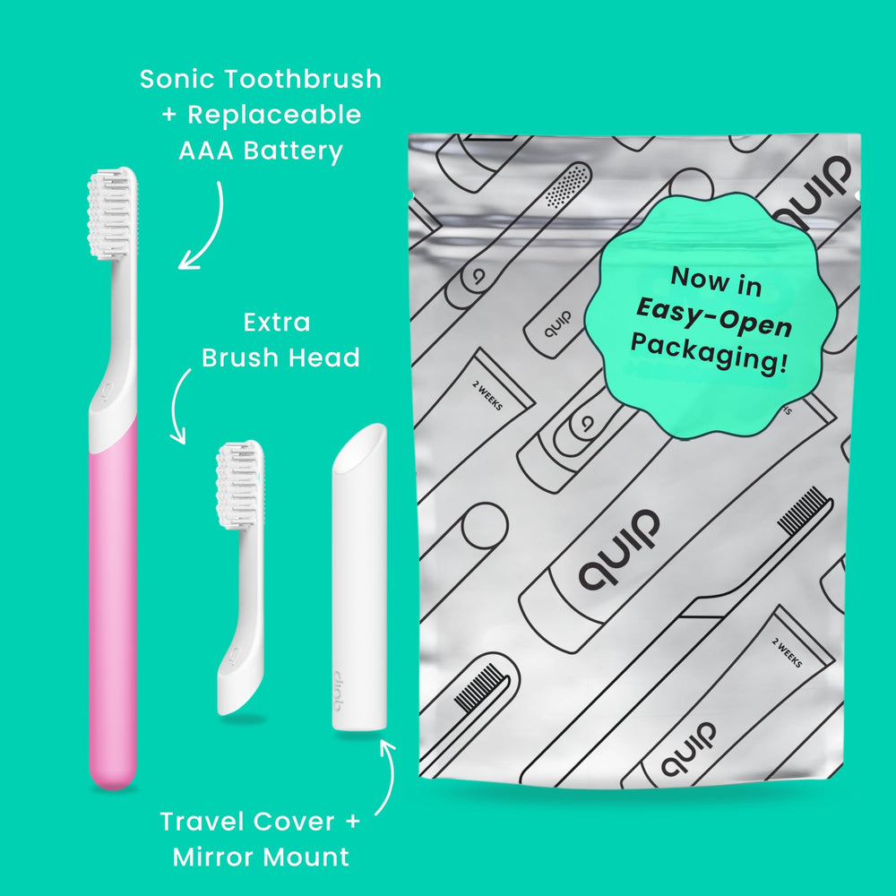 Side view of magenta quip toothbrush