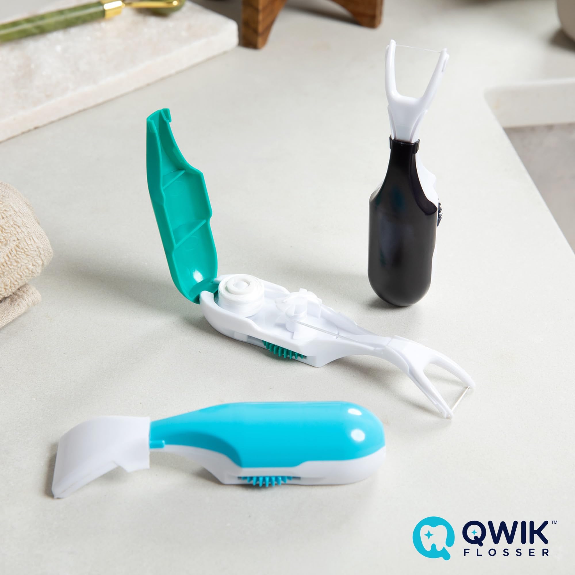QWIK flosser with travel cover shown for travel and reuse
