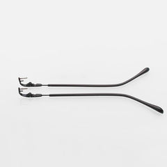 Close-up of black replacement temple arm for rimless glasses