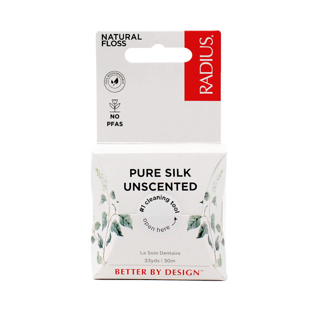 Close-up of RADIUS floss packaging and natural silk floss