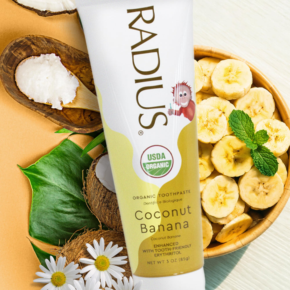 Colorful tropical-themed toothpaste packaging close-up