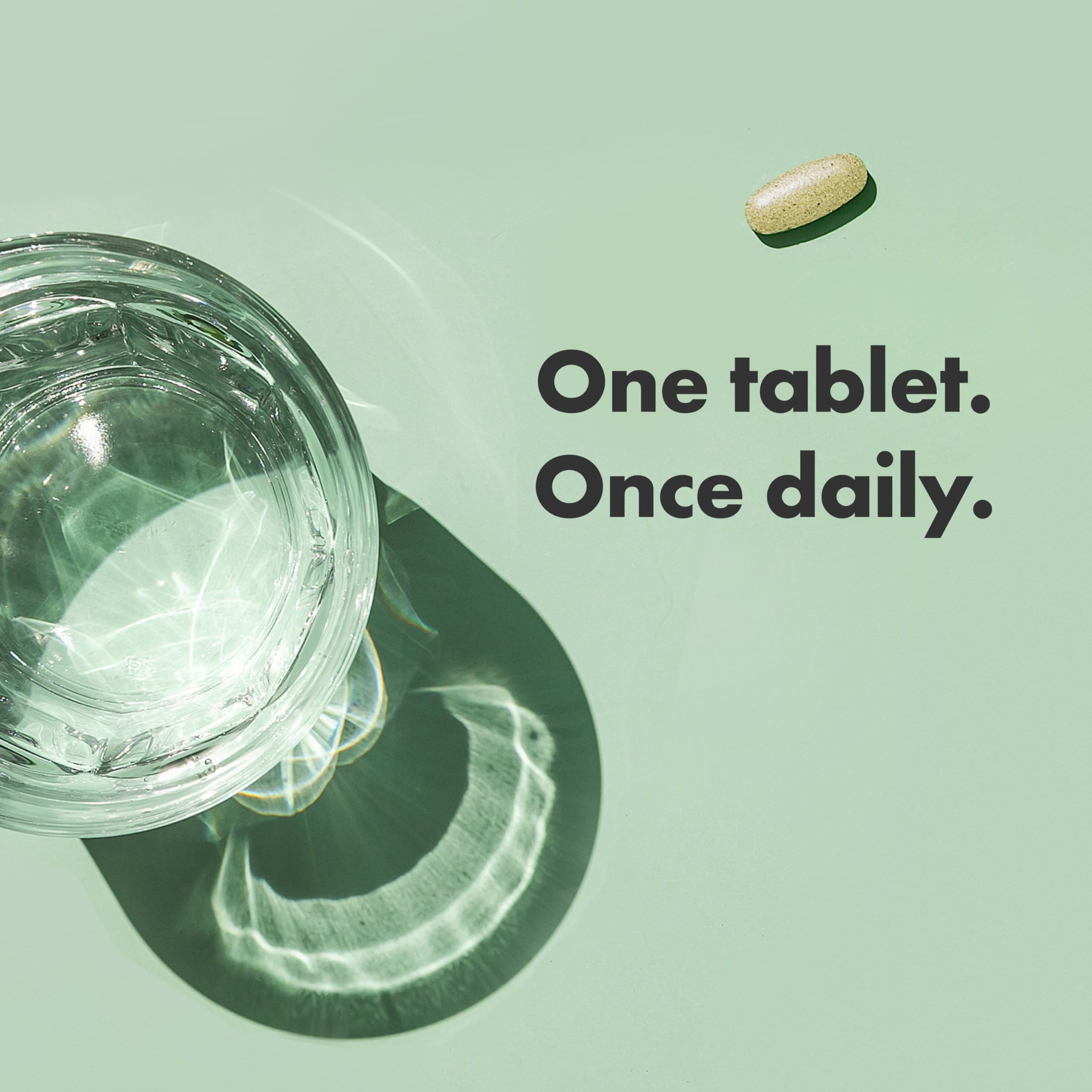 Jar on kitchen counter with Rainbow Light Multivitamin Women’s One Powder 120 Count