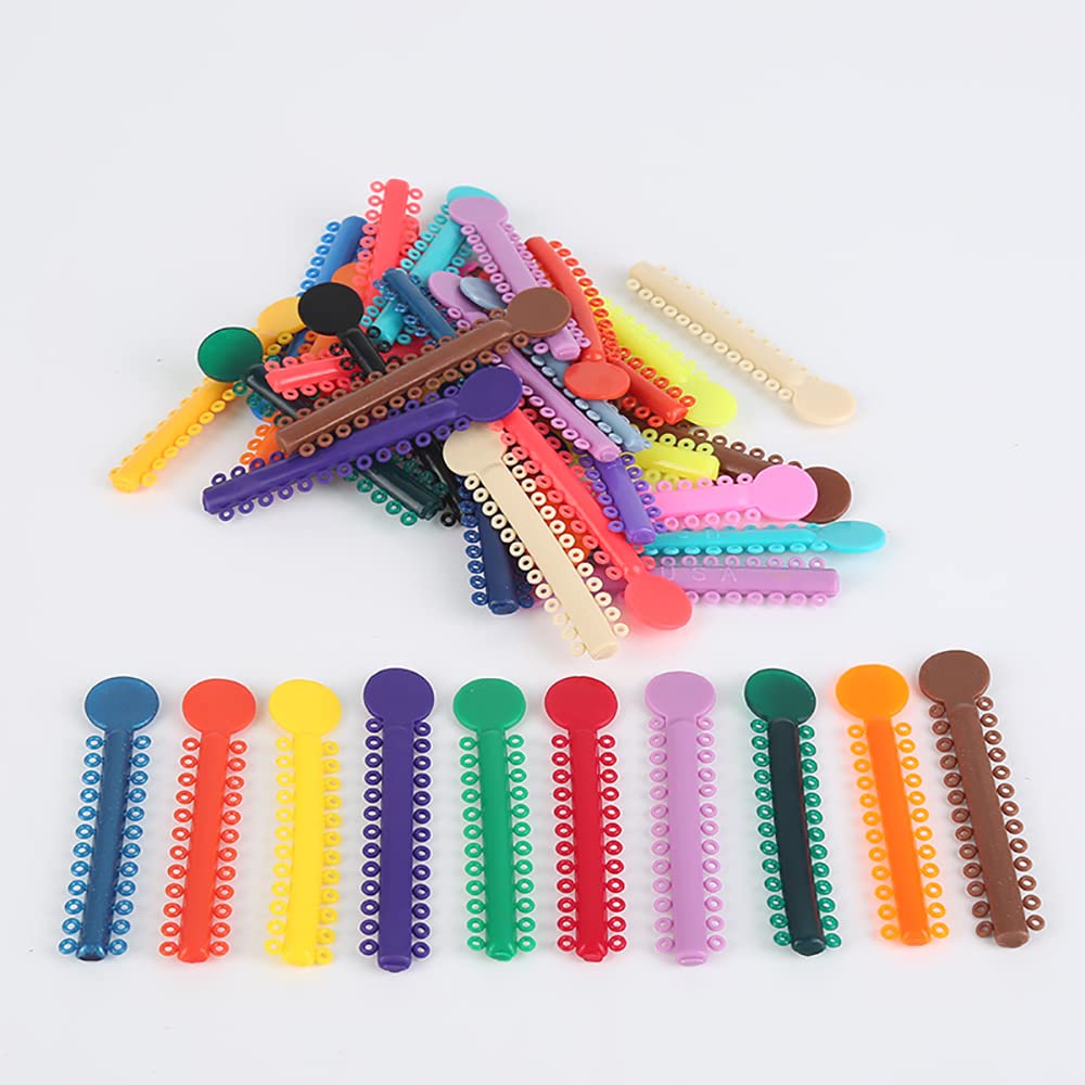 Random color elastomeric ligature ties with high elasticity and soft material.