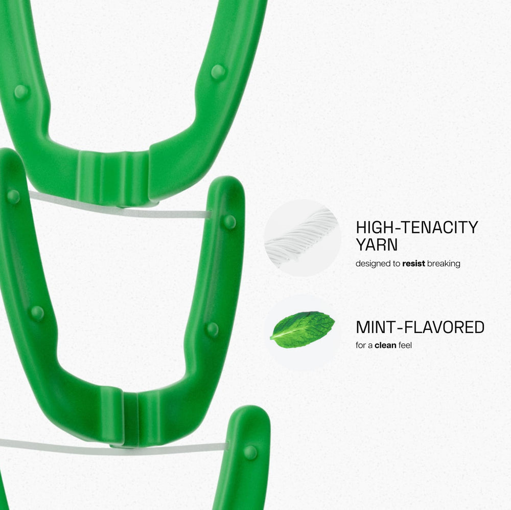 Ergonomic Reach flosser handle close-up