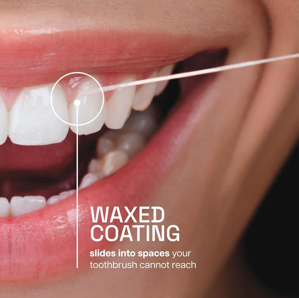 Side view of REACH Mint Waxed Floss Pack of 2
