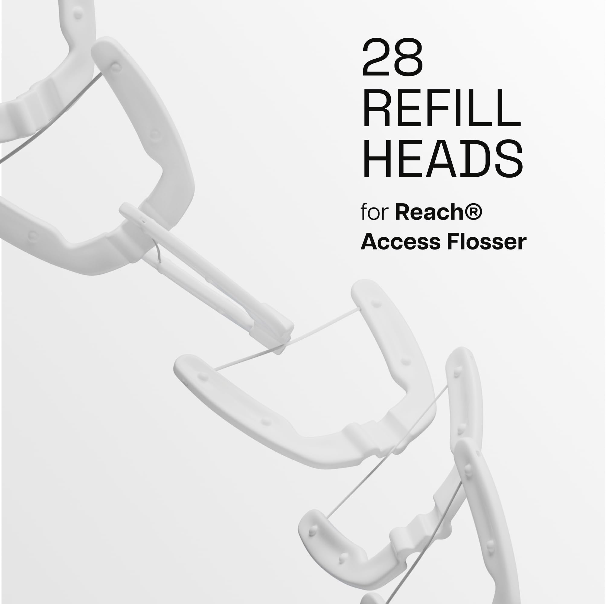 Close-up of Reach Ultraclean Access Flosser starter kit components