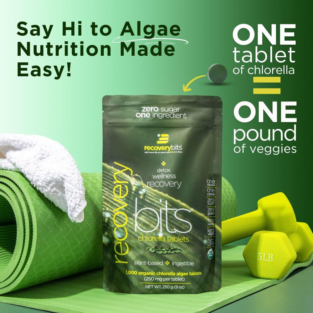 Chlorella tablets spilled on a white surface