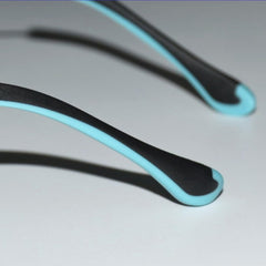 Rectangular thin metal eyeglass leg with end tip attached
