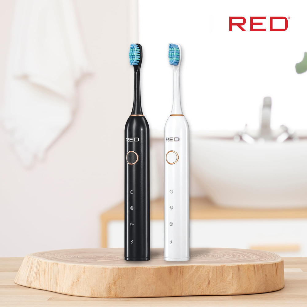Compact travel-friendly design of Red by Kiss toothbrush