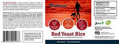 Close-up of Red Yeast Rice capsules in a bottle