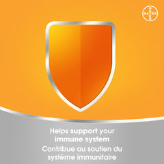 Dissolving orange tablet in a glass of water