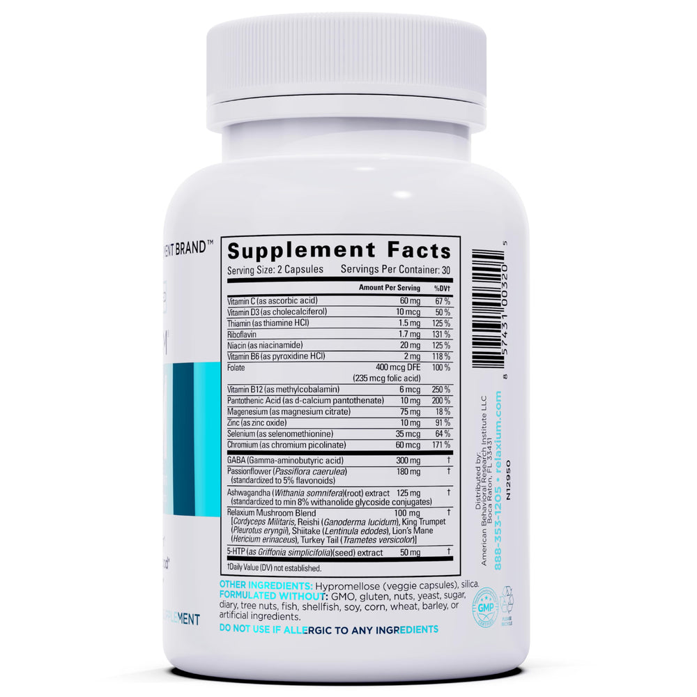 Ashwagandha roots next to Relaxium Calm bottle