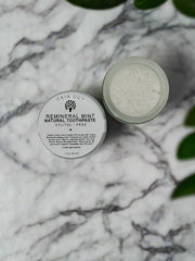 Close-up of Remineral Mint toothpaste ingredients and natural minerals