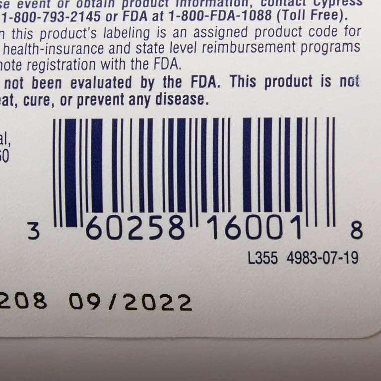 Close-up of Rena-Vite bottle cap and supplement tablets