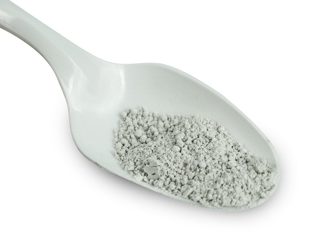 Rep-Cal calcium ultrafine powder sprinkled on reptile food