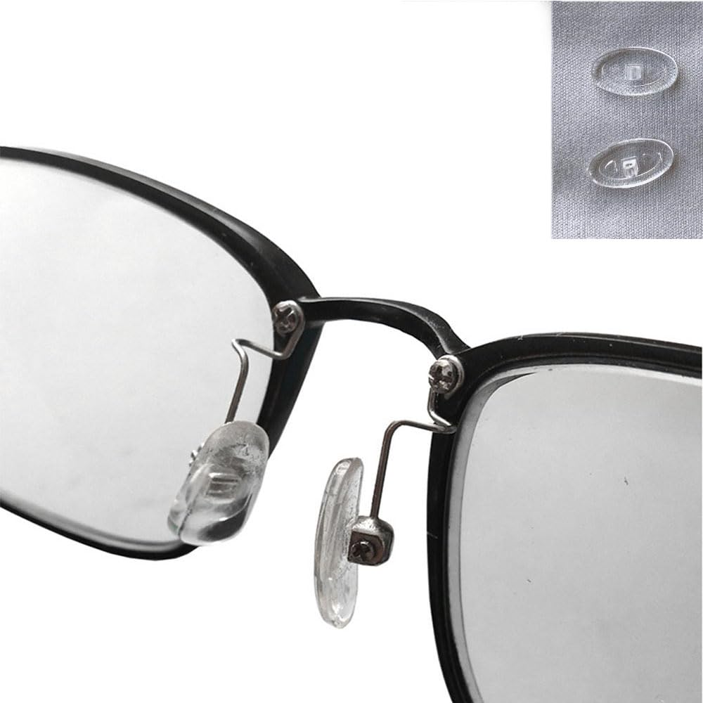 Packaging contents: arms, pads, and screwdriver