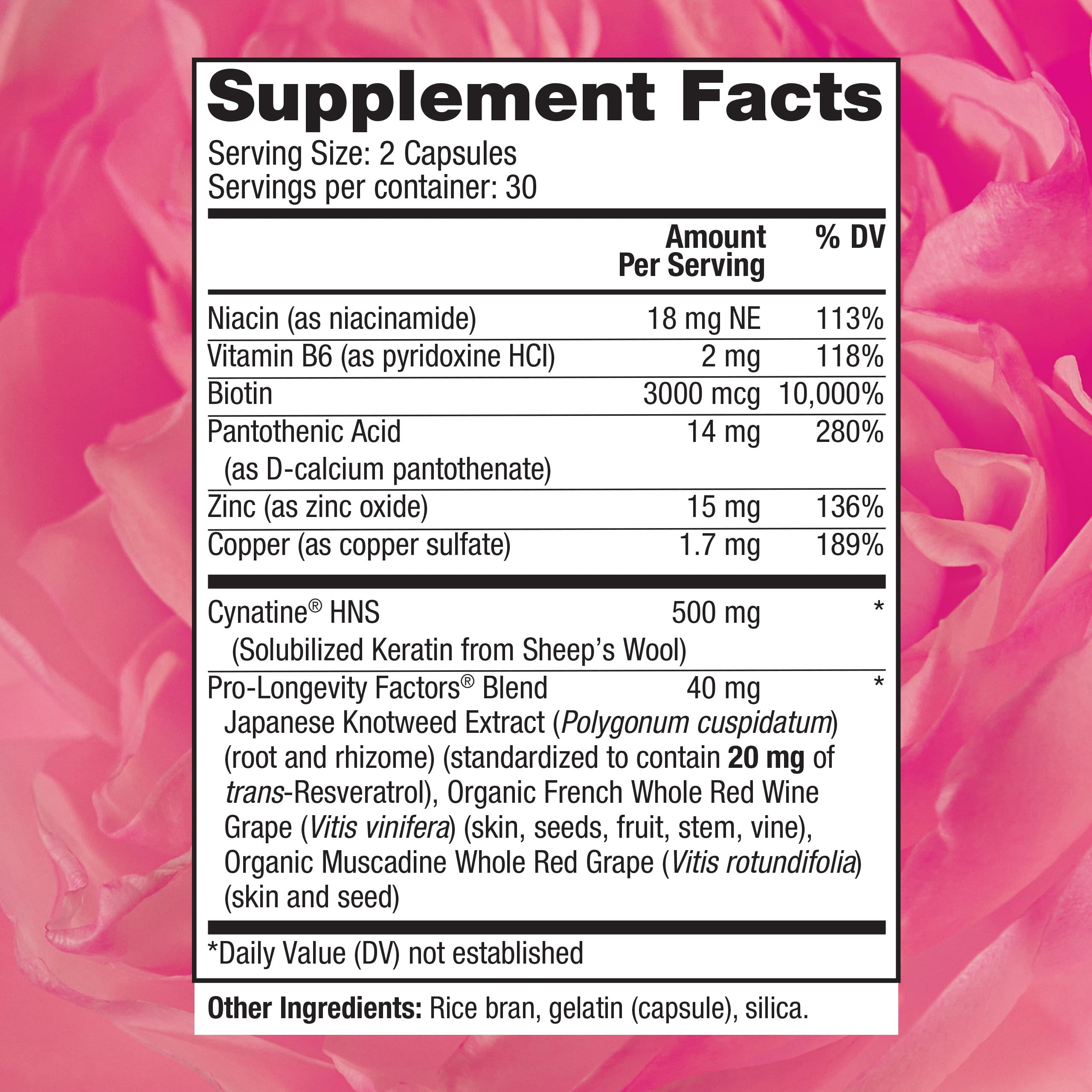 Label on Keratin Hair Booster bottle showing biotin and resveratrol
