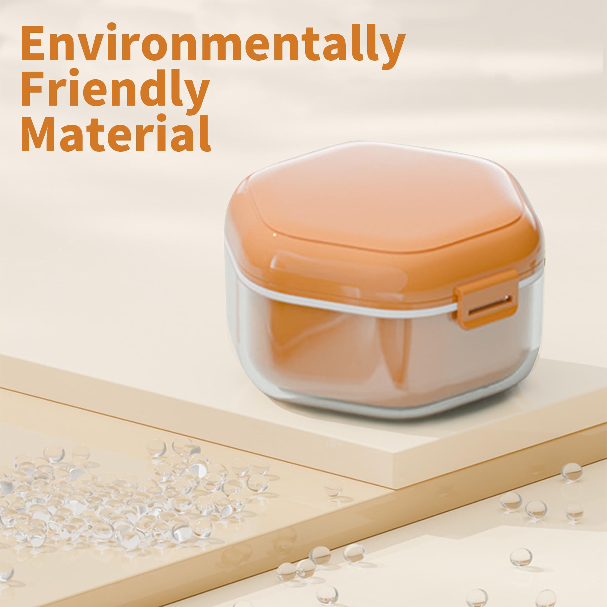 Closed lid of orange leak-proof denture box