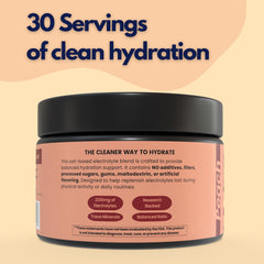 Rhovive Electrolyte Powder glass showing raspberry flavor for hydration