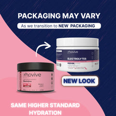Rhovive Electrolyte Powder Raspberry scoop pours into glass for rapid electrolyte replenishment.