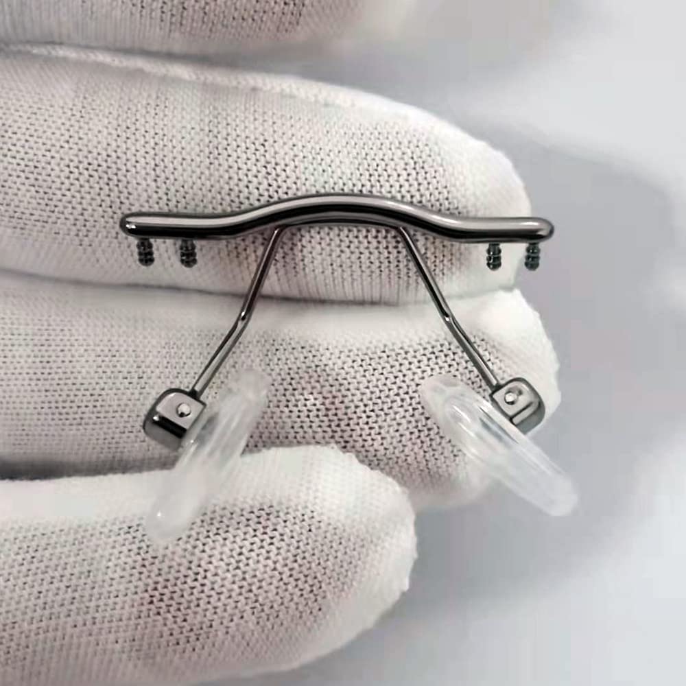 Double rubber plugs for rimless glasses nose bridge