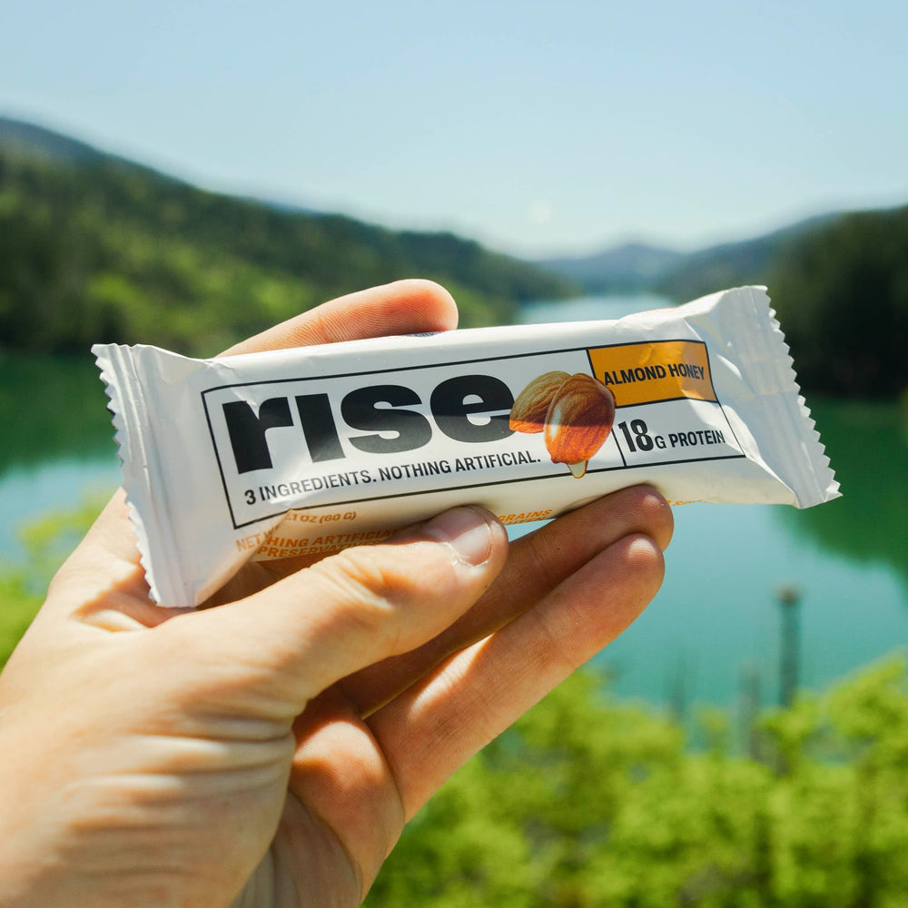 Serving Rise Bar Almond Honey on the go with a beverage