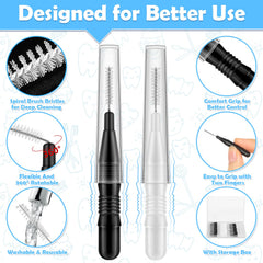 Assorted black and white interdental brushes laid out