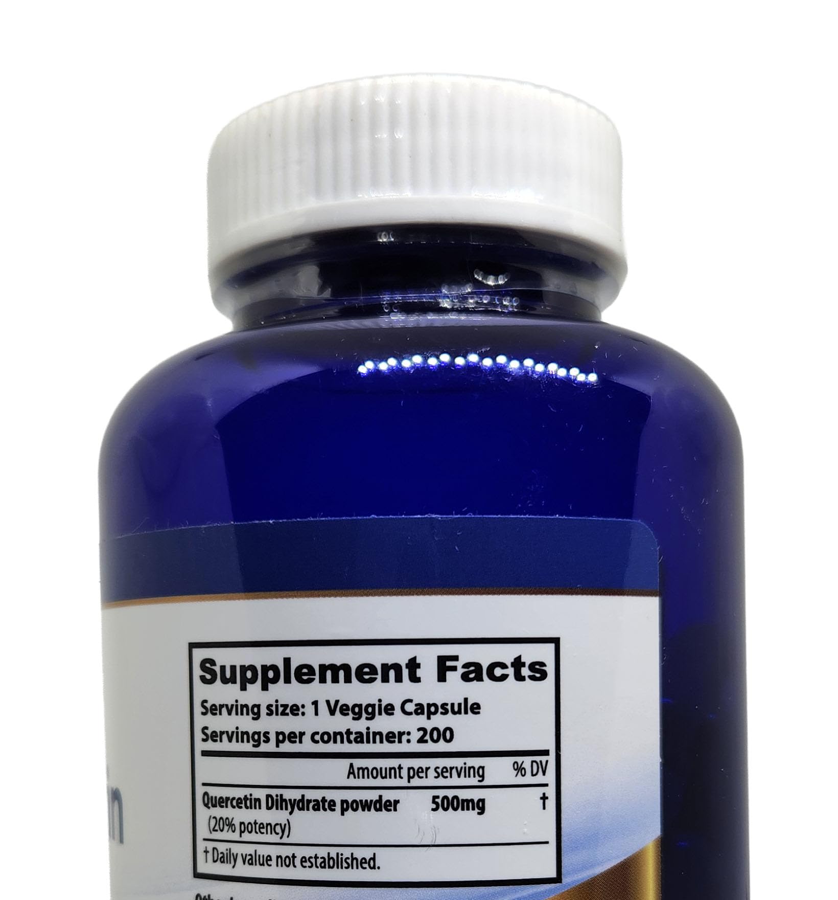 Close-up of dosage instruction take 1 capsule before a meal