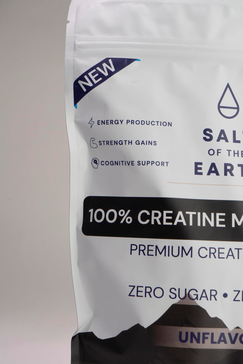 Packaging opened to reveal the container inside